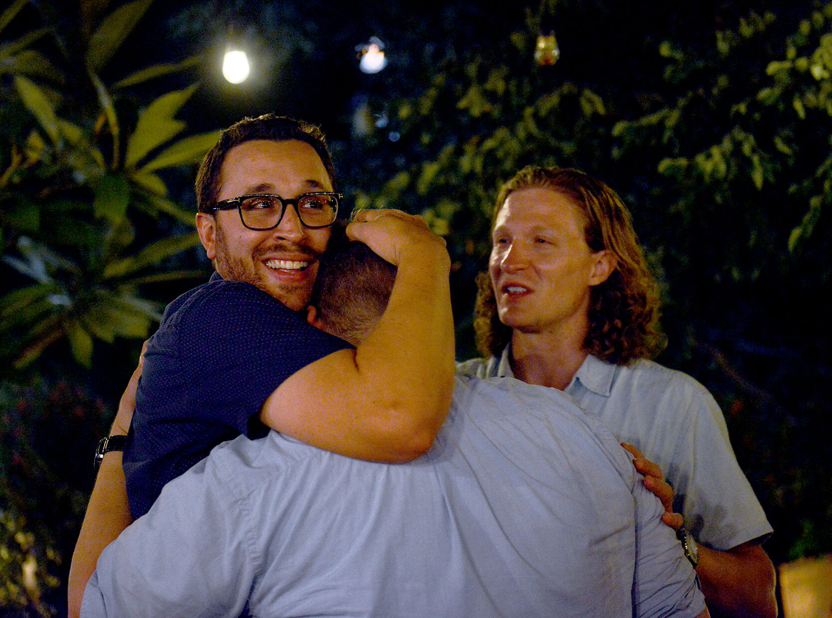 Bob Nolte hugs brothers Mark Nolte and Steven Nolte (copy)